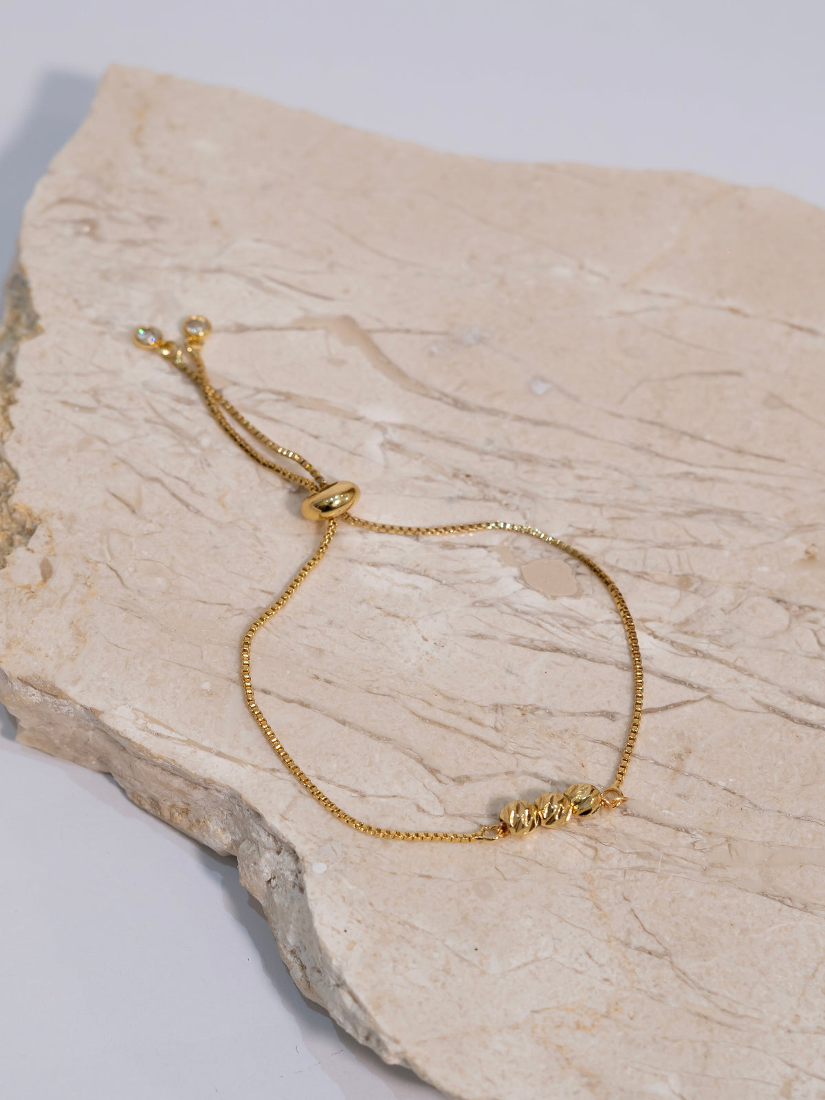Pulsera destellos dorados